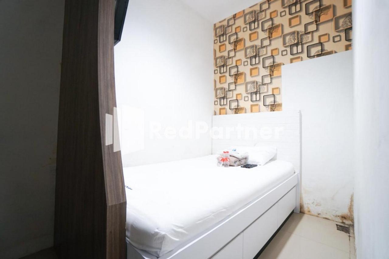 Eascot Hotel Mitra Reddoorz Giacarta Esterno foto