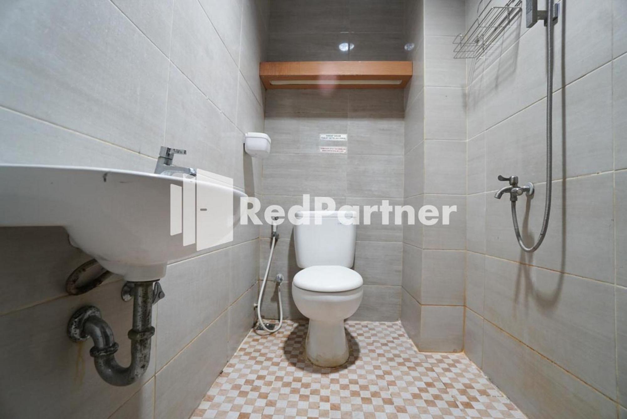Eascot Hotel Mitra Reddoorz Giacarta Camera foto