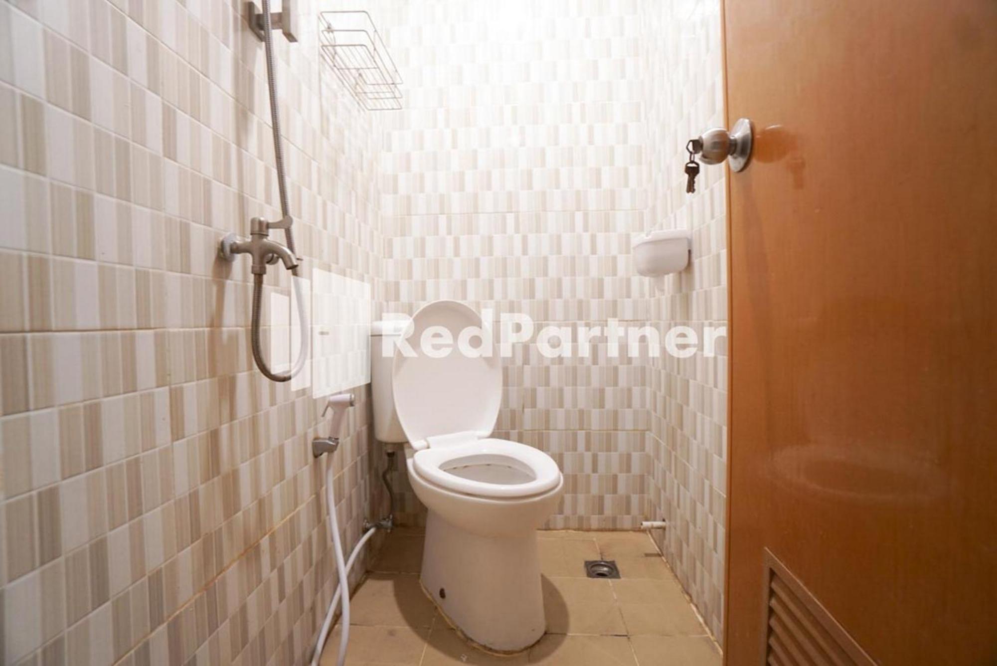 Eascot Hotel Mitra Reddoorz Giacarta Camera foto