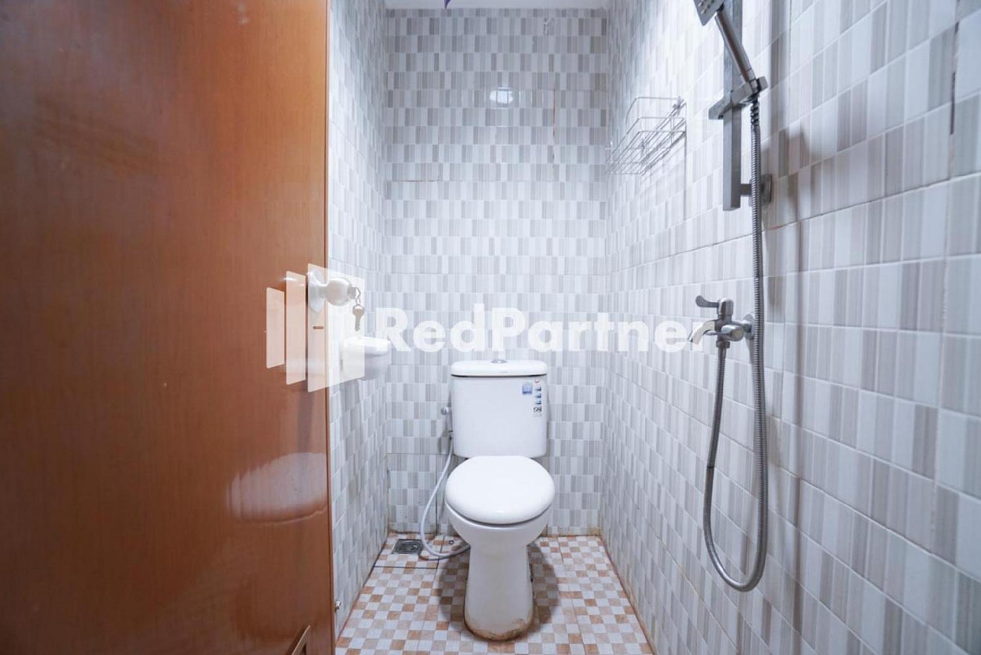 Eascot Hotel Mitra Reddoorz Giacarta Camera foto