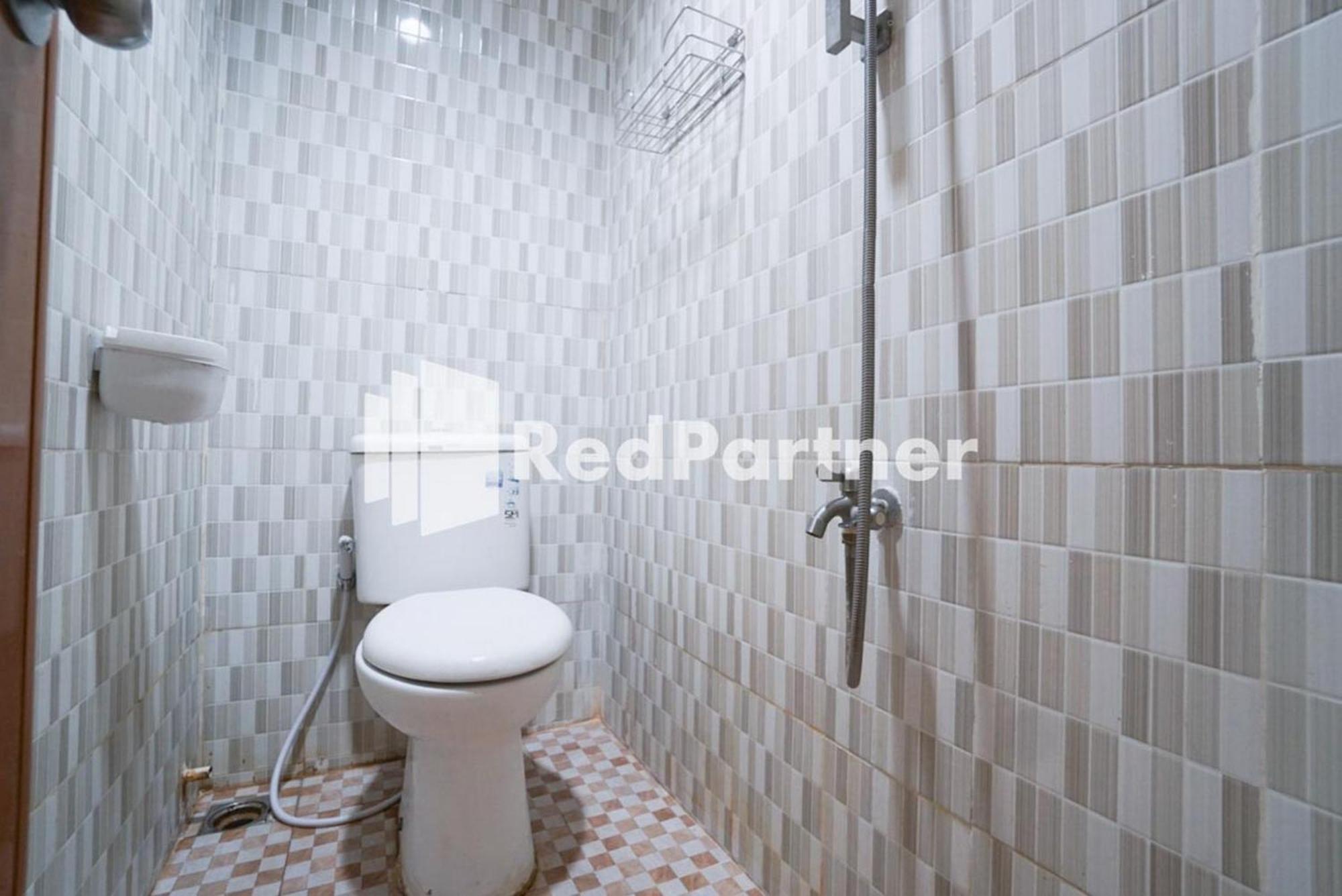 Eascot Hotel Mitra Reddoorz Giacarta Camera foto